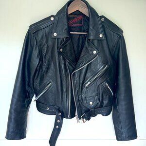 Vintage! A classic. Black leather biker jacket.